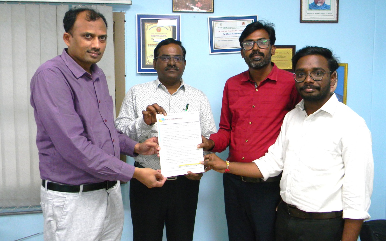 RIZIQ representatives marking an institutional agreement
