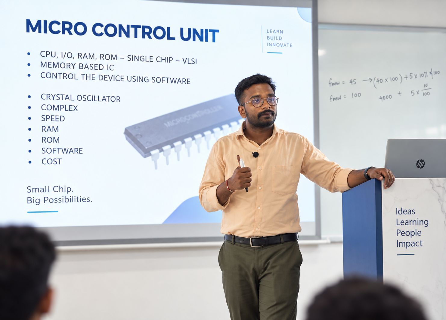 Jessy Yadav Maddina teaching microcontrollers in a digital classroom